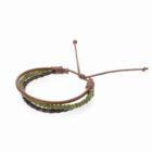 Brown leather bracelet with green beads and adjustable strings on white background.