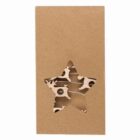 Brown cardboard box with a star-shaped window revealing a wooden puzzle inside.