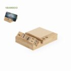 Bamboo desk organizer with phone holder, calendar blocks, and notepad.