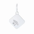 Square white keychain with text and symbols, attached to a silver keyring.