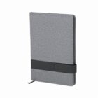 Grey fabric notebook with a black elastic strap, standing upright on a white background.