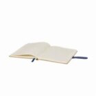 Open notebook with lined pages and a blue ribbon bookmark on a white background.