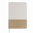 Notebook with a two-tone cover: textured white upper and smooth beige lower.