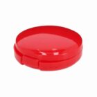 Round red plastic container on a white background.