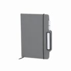 Gray notebook with an elastic band and attached black pen.