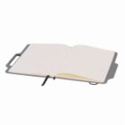 Open notebook with white pages and a black ribbon bookmark.