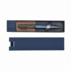 A blue pen in a blue box with its lid removed.