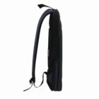 Side view of a slim black backpack on a white background.