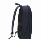 Side view of a navy blue backpack with black details, showing one shoulder strap.