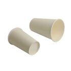 Two white paper cups, one upright and one on its side, on a plain white background.