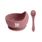 Pink silicone baby bowl with a curved edge and matching spoon, labeled Baby Kids.