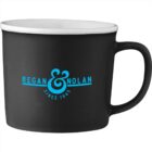 Black mug with Regan & Nolan Since 1945 in blue text on the front.