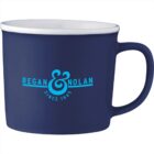 Navy blue mug with Regan & Nolan Since 1945 printed in light blue on the front.