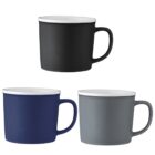 Three ceramic mugs in black, blue, and gray, each with a handle and white interior.