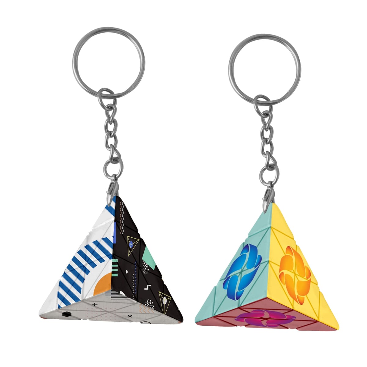 Two colorful pyramid-shaped keychains with geometric patterns and metal rings.