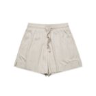 Beige drawstring shorts laid flat with side slits at the hem.