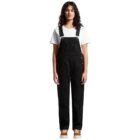 Person wearing black overalls, a white t-shirt, and brown shoes, standing against a white background.