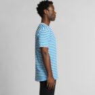 Man in a blue and white striped t-shirt standing sideways against a plain background.