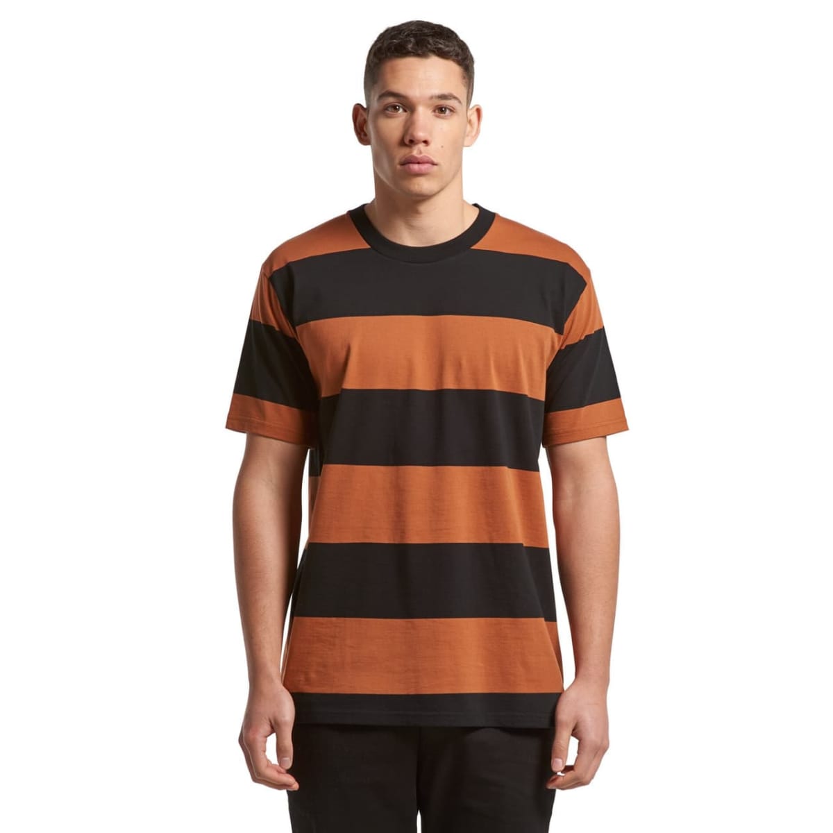 Man wearing a short-sleeve black and orange striped t-shirt, standing against a white background.