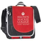 Red and black messenger bag with Brown Mackie College Fort Wayne logo.