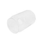 A clear, empty glass tumbler lying on its side on a white background.