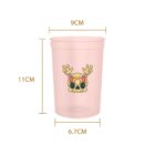 A pink cup with decorative design and dimensions of 11CM x 9CM x 6.7CM.