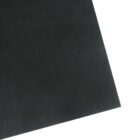 Close-up of a textured black sheet with a slight diagonal angle.
