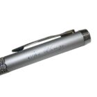 Silver pen with a textured grip and “The Range” engraved on the barrel.