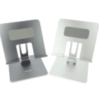 Two adjustable metal laptop stands, one black and one silver, on a white background.