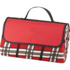 Red and plaid picnic blanket folded with a black handle.