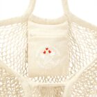 Close-up of a net shopping bag with Winchester Market logo.