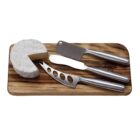 Cheese wheel on a wooden board with three cheese knives.