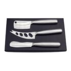 Three stainless steel cheese knives on a black rectangular tray.