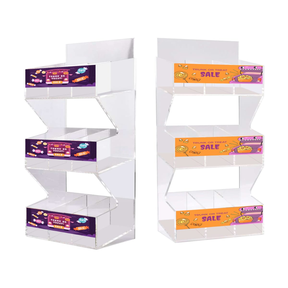 Two empty candy display stands with Halloween sale signs.