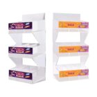 Empty Halloween-themed candy display shelves with colorful sale banners.
