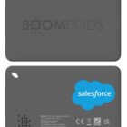 Two gray rectangular devices showing Boompods and Salesforce logos, plus certification symbols.