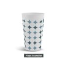 White cup with blue and white circle pattern and text Heat transfer below.