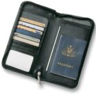 Open black travel wallet with passport and various cards in slots.