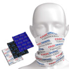 Mannequin with branded neck gaiters and folded samples nearby.