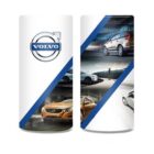 Volvo-themed design with car images and the Volvo logo on two vertical banners.