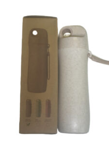 Eco-friendly drinkware: a reusable white water bottle beside its cardboard packaging.