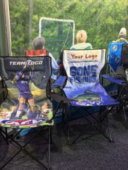 Two folding chairs with APPA 2025 sports and fishing designs, displayed indoors.