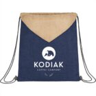 A blue drawstring bag with Kodiak Coffee Company logo and a bear design.