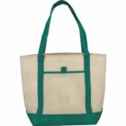Canvas tote bag with green straps and a front pocket.