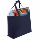 Navy tote bag filled with household items, including detergent and an orange drink.