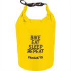 Yellow dry bag with Bike Eat Sleep Repeat printed on it.