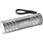 Silver flashlight with a black wrist strap, engraved with CORT.