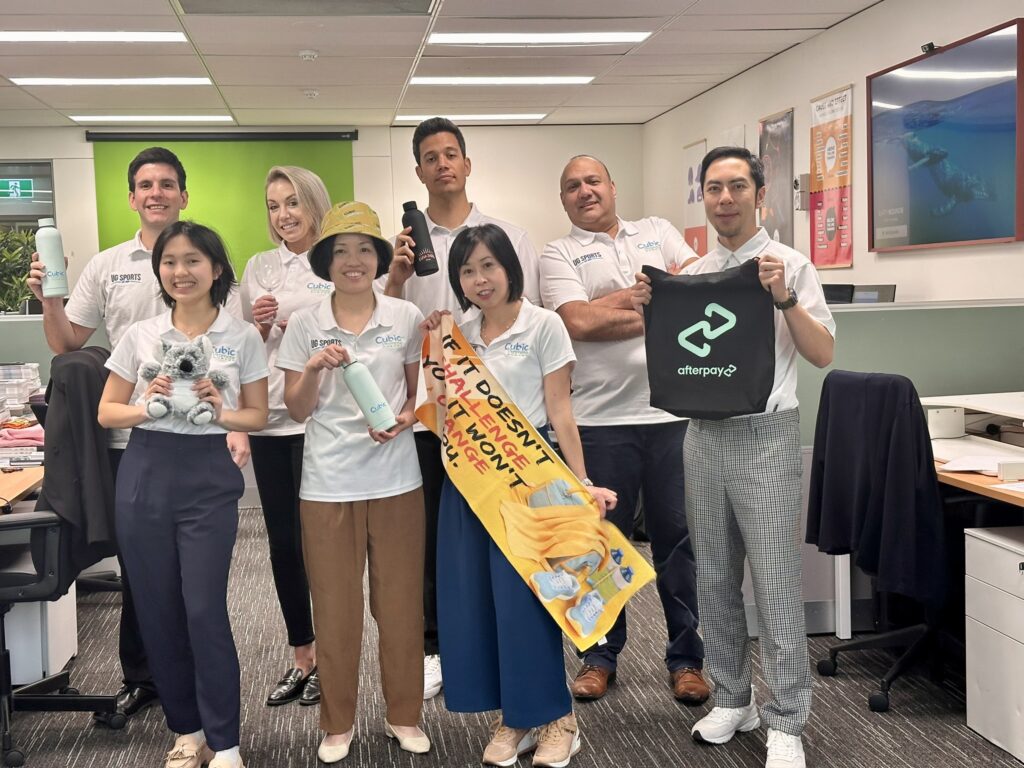 Team Photo - 8 members of the Cubic Promote team in a photo