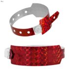 Red holographic wristbands with adjustable holes and a white snap closure.