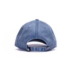 Blue denim baseball cap viewed from the back, showing adjustable strap and buckle.